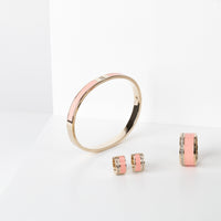 coral-gold-huggie-earrings-stainless-hypoallergenic-T216E001CO-MIA