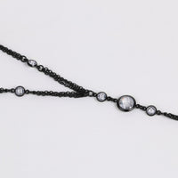 black long necklace with stones
