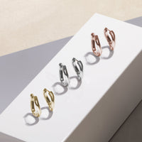 minimal twist rose gold stainless steel huggie earrings